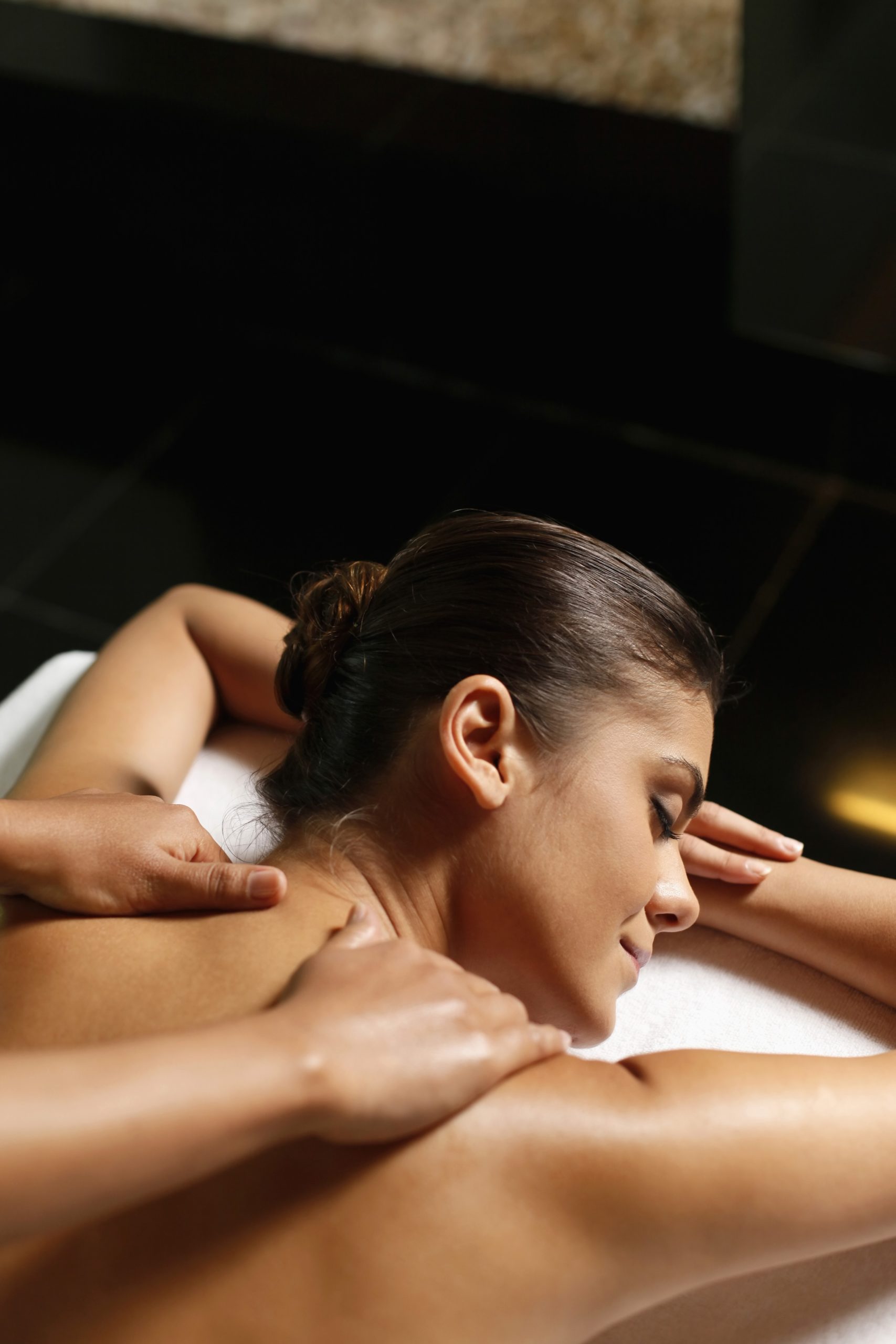 woman receiving massage therapy